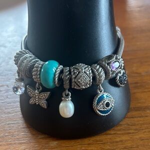 Judith Ripka hallmarked sterling charm bracelet with 9 hallmarked charms